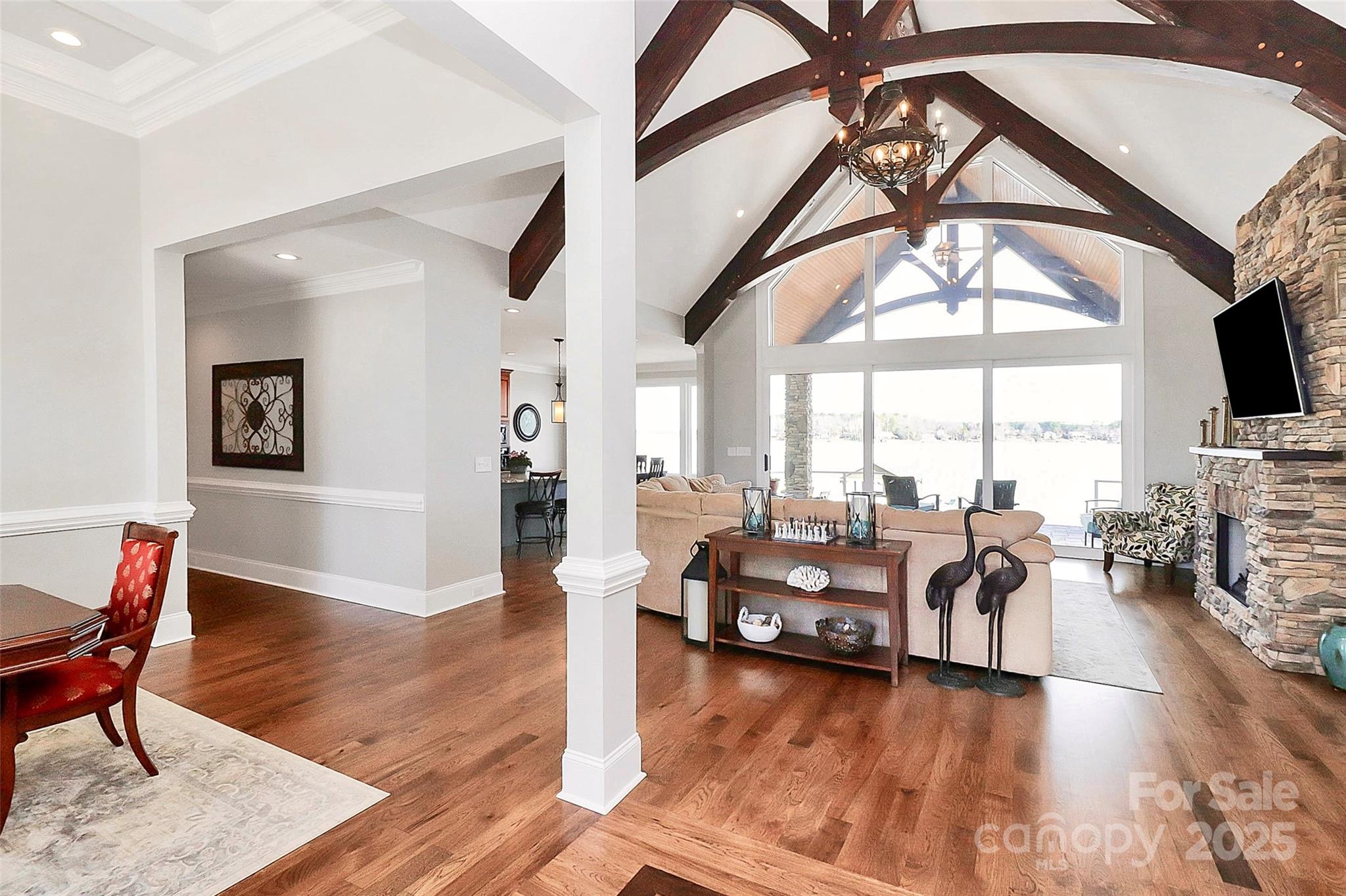 5086 Windward Point Lane Denver, NC 28037 - Photo 4 of 36 a living room with furniture or couch and a flat screen tv