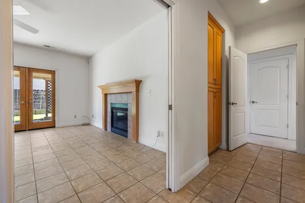 a bathroom with a tub shower and sink