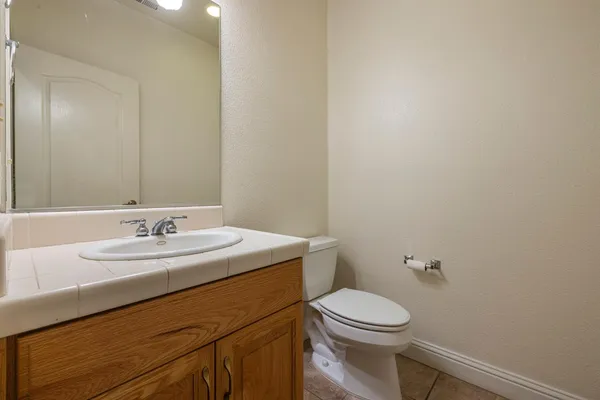a bathroom with a sink a mirror and a bathtub