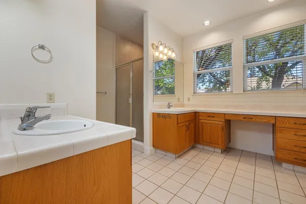 a view of a sink and a mirror
