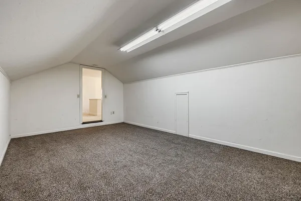 a view of a room that has a window