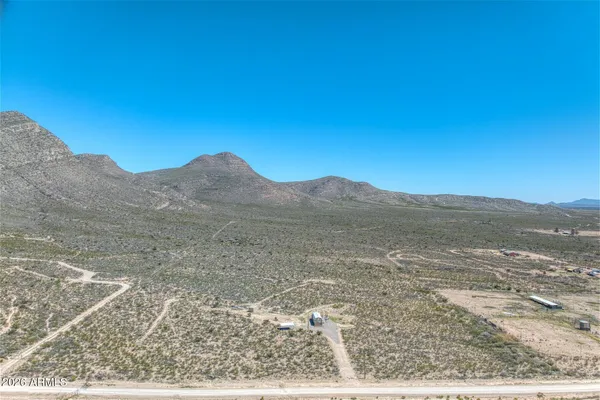 a view of mountain view with mountains in the background