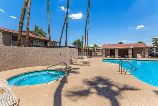 a view of a house with swimming pool
