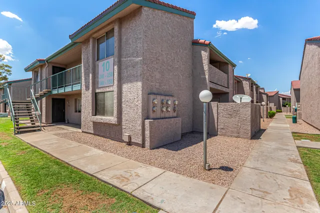 a front view of a house with yard