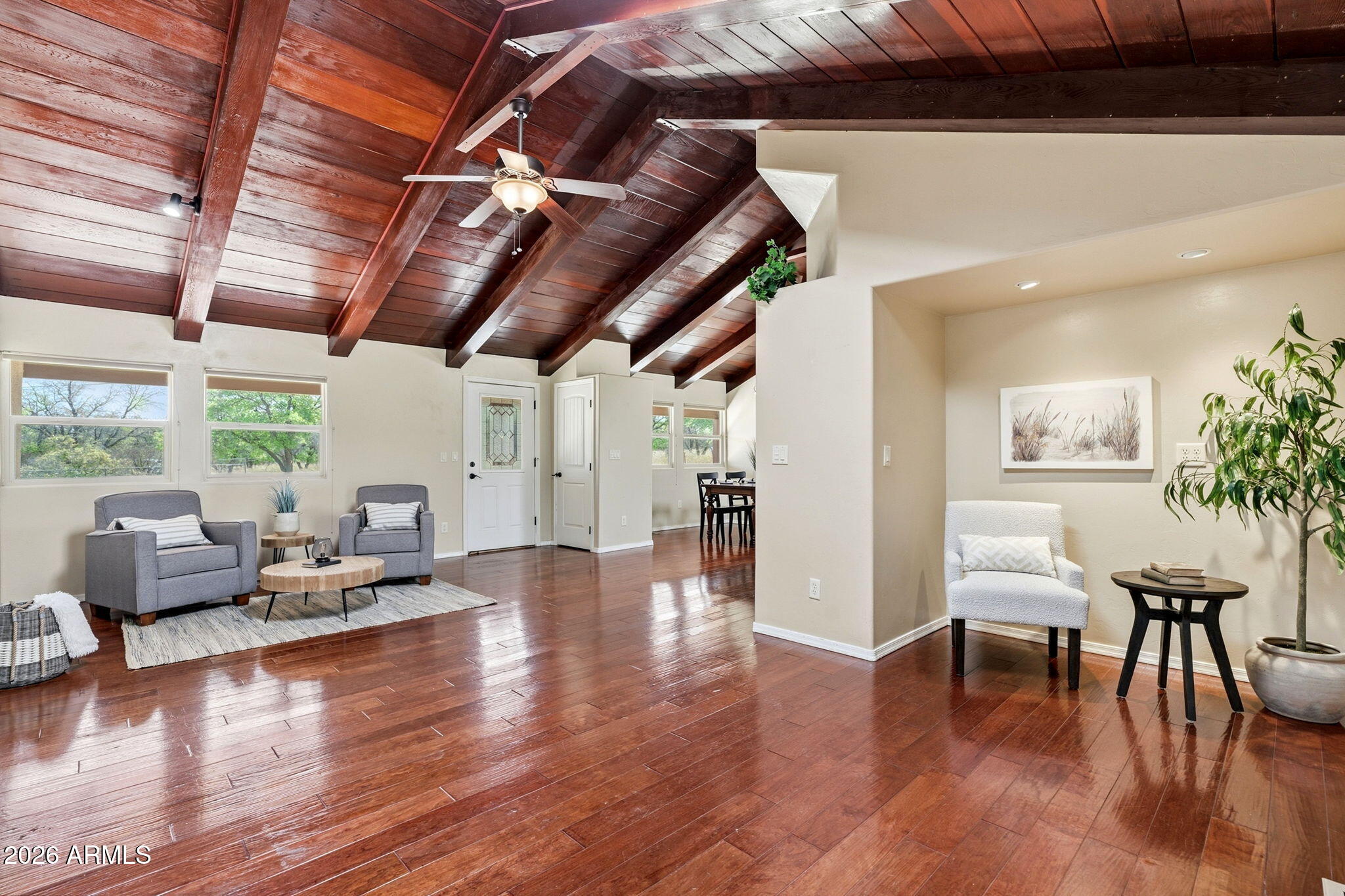 9626 South Turkey Track Road Hereford, AZ 85615 - Photo 15 of 54 a living room with furniture and a wooden floor