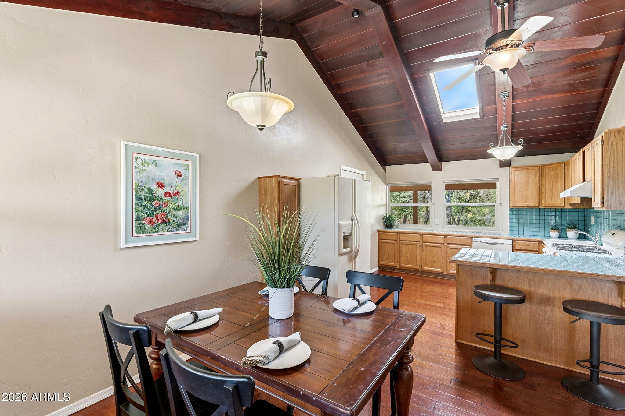 9626 South Turkey Track Road Hereford, AZ 85615 - Photo 3 of 54 a view of a dining room with furniture window and wooden floor