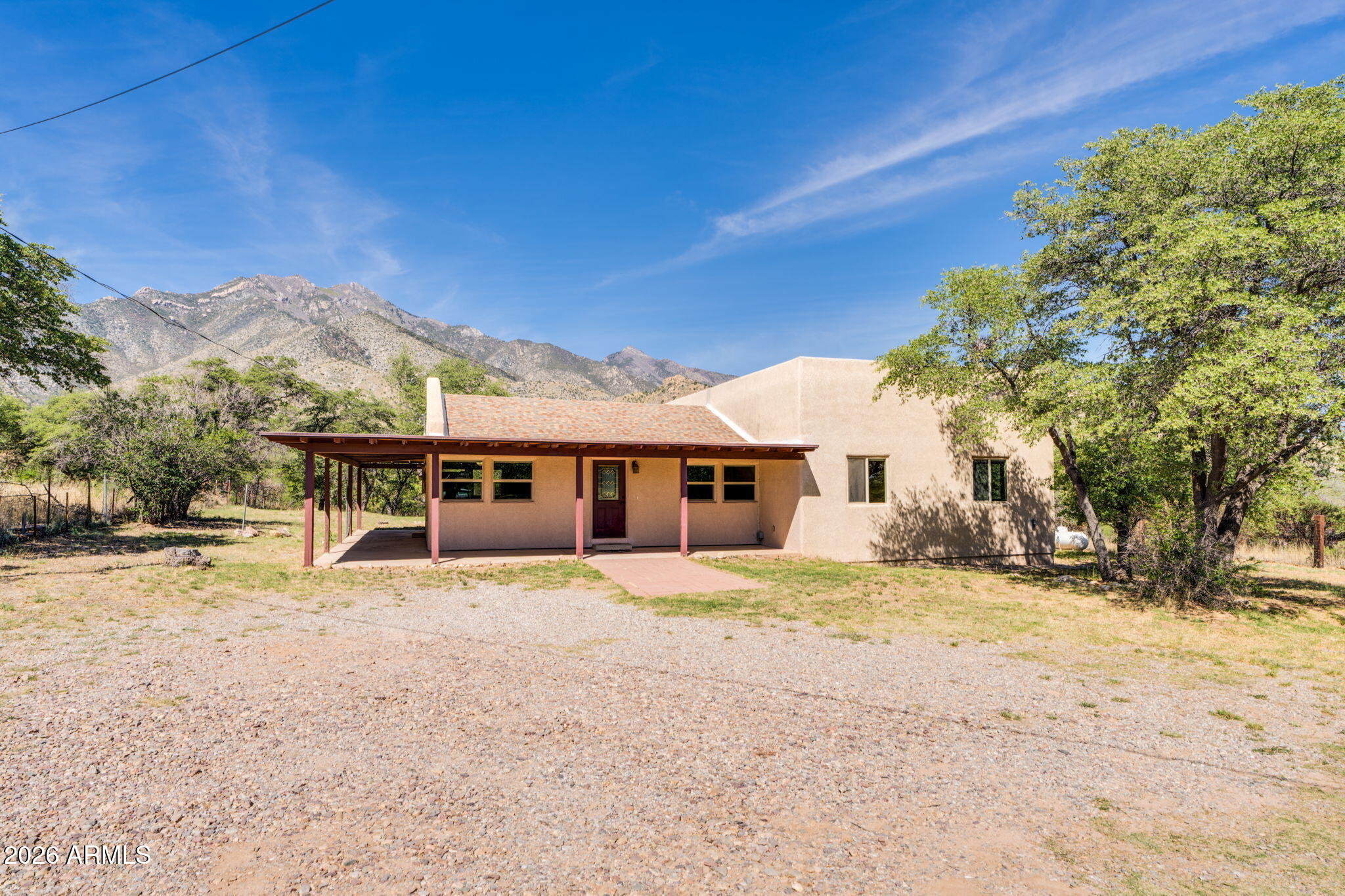 9626 South Turkey Track Road Hereford, AZ 85615 - Photo 10 of 54 a view of a house with a yard