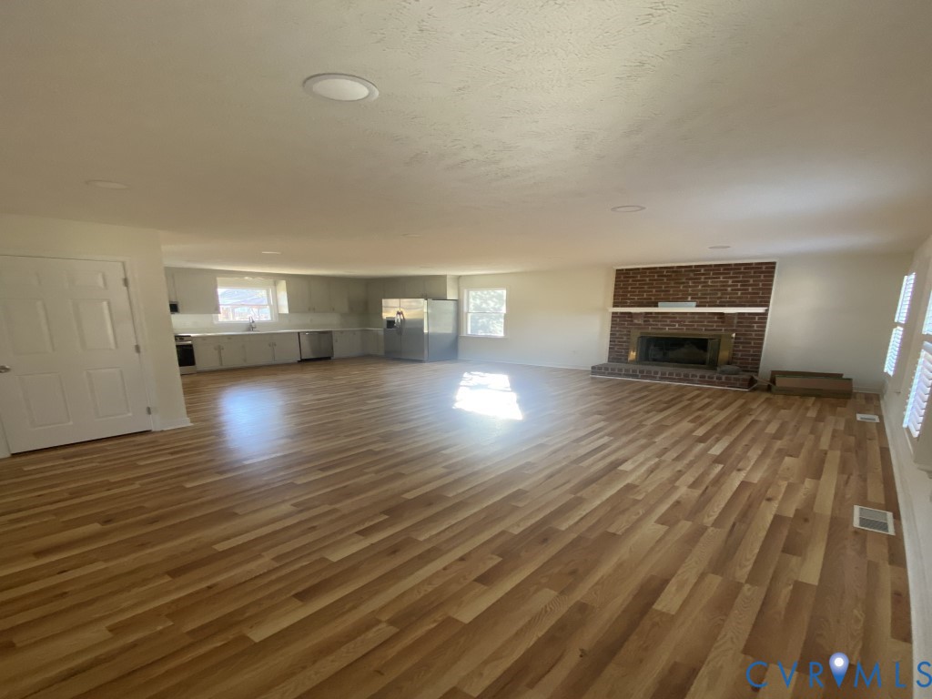 6466 Birch Tree Trace Mechanicsville, VA 23111 - Photo 2 of 8 a view of empty room with wooden floor