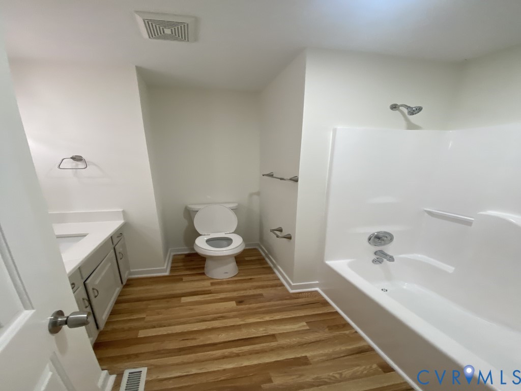 6466 Birch Tree Trace Mechanicsville, VA 23111 - Photo 7 of 8 a bathroom with a sink and a bathtub