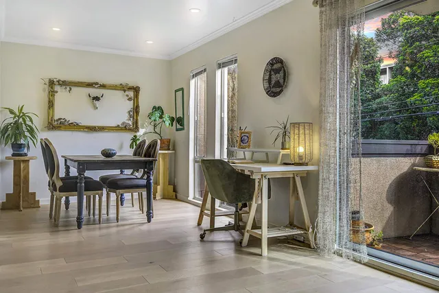 a workspace with furniture and window