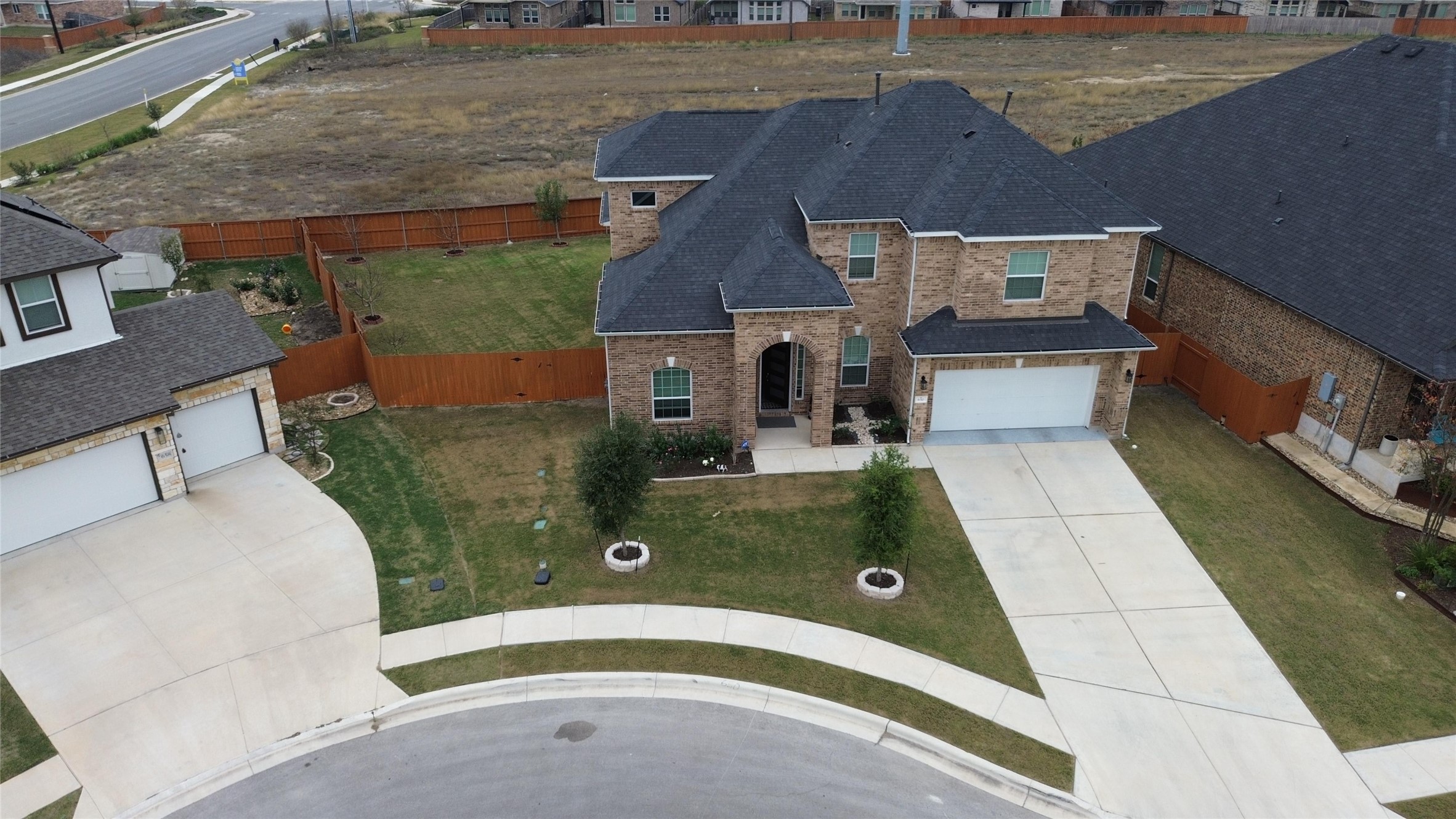 650 Wild Pecan Loop Buda, TX 78610 - Photo 3 of 28 Aerial perspective of suburban area