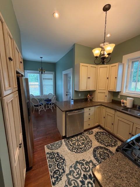 82 Nightingale Street Barnwell, SC 29812 - Photo 6 of 13 a kitchen with stainless steel appliances granite countertop a refrigerator a sink dishwasher a dining table and chairs with wooden floor