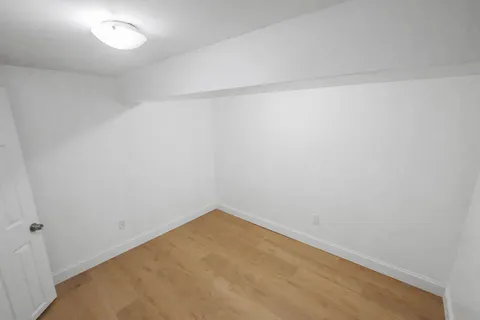 a living room with a couch and a flat screen tv