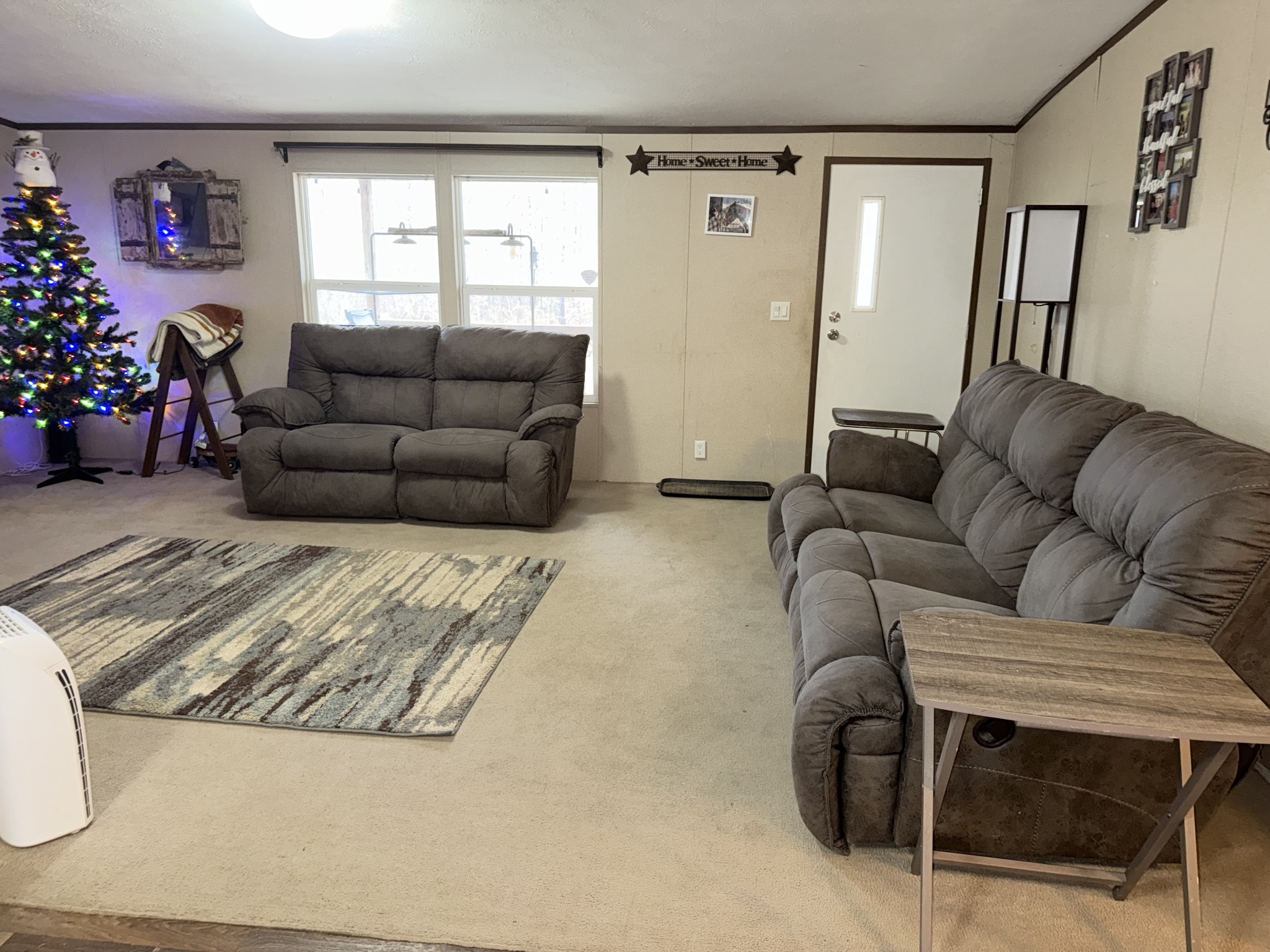 239 Henderson Road Hohenwald, TN 38462 - Photo 13 of 61 a living room with furniture