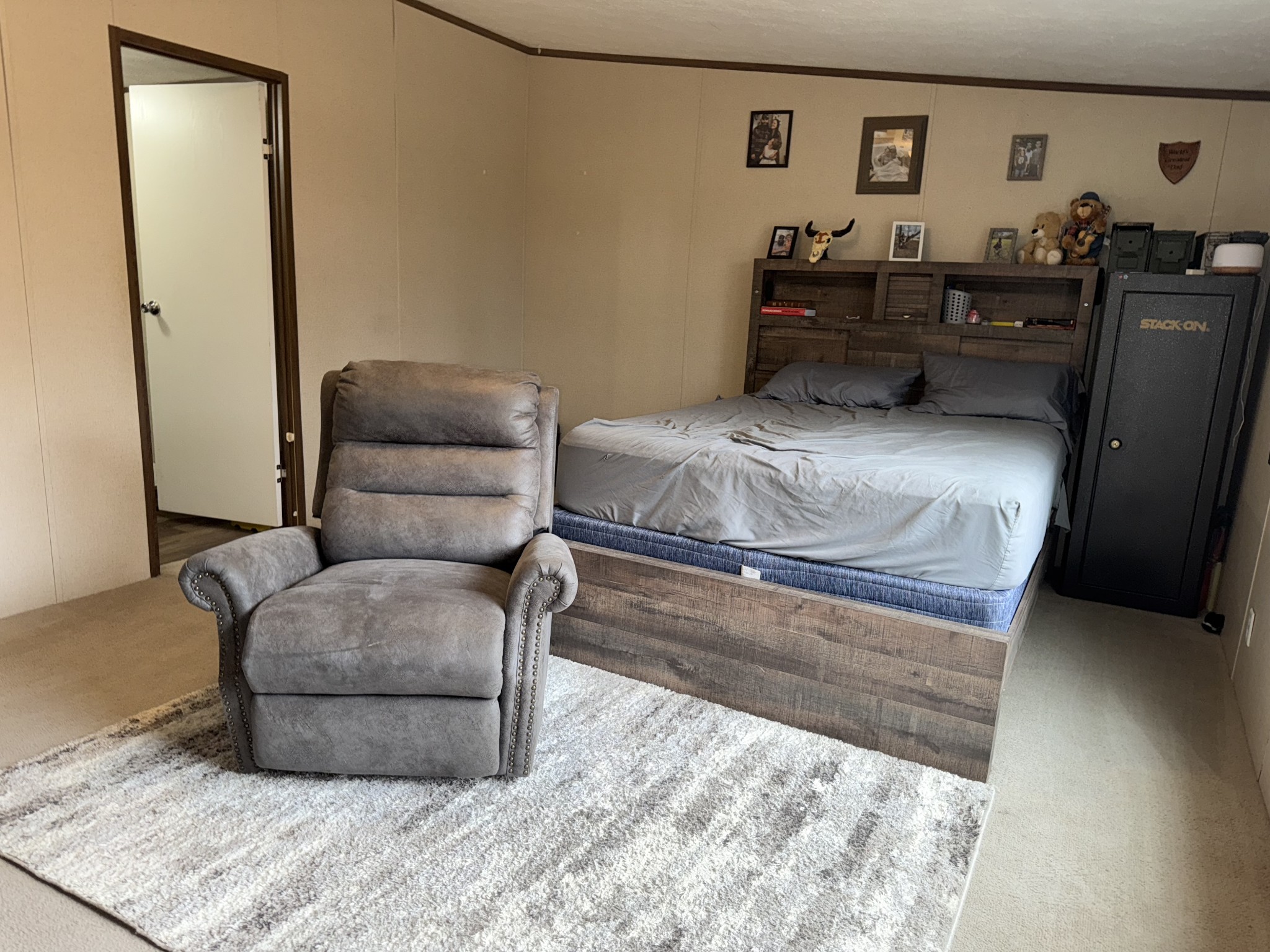 239 Henderson Road Hohenwald, TN 38462 - Photo 18 of 61 a bedroom with a bed and window