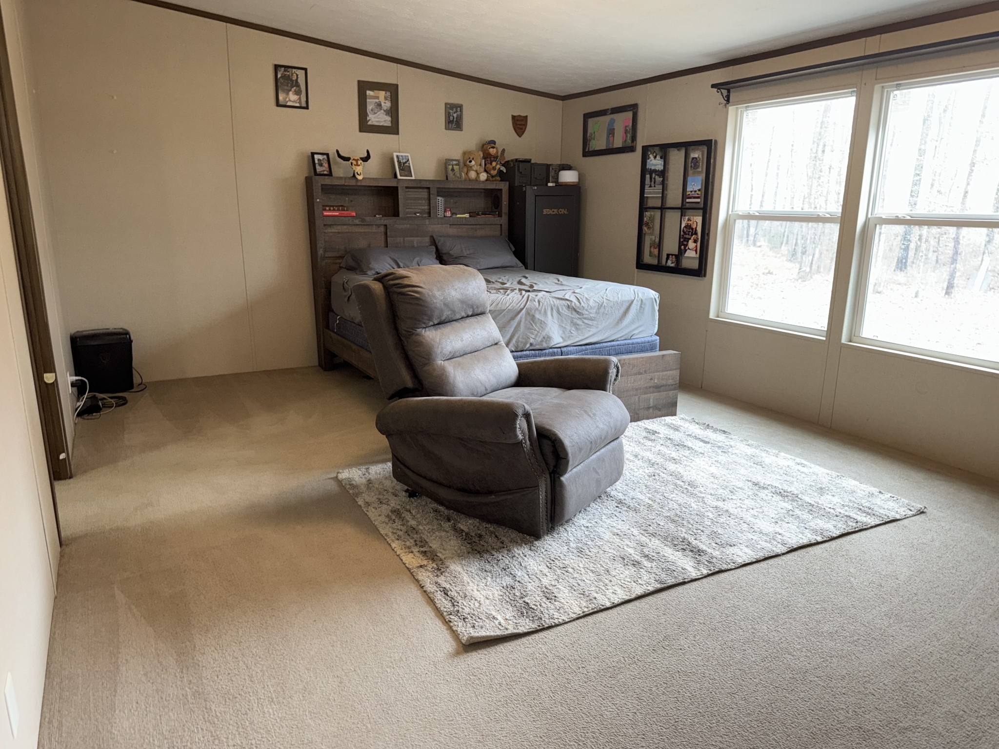 239 Henderson Road Hohenwald, TN 38462 - Photo 19 of 61 a living room with furniture and a rug