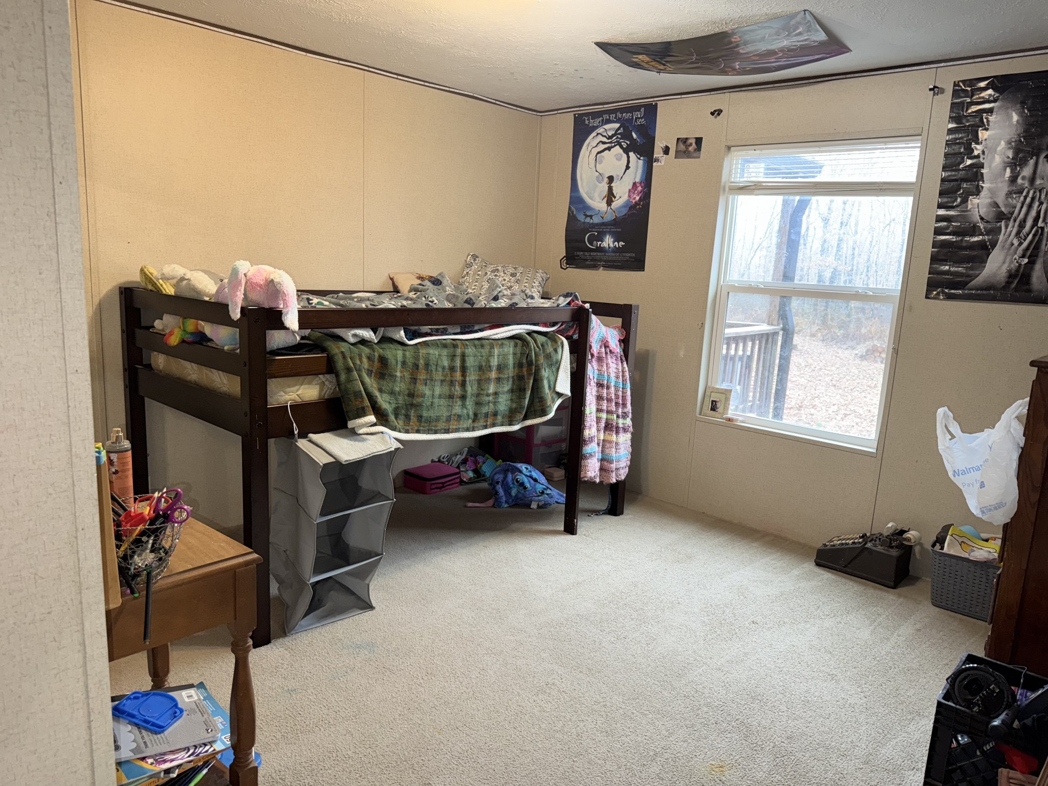 239 Henderson Road Hohenwald, TN 38462 - Photo 23 of 61 a living room with furniture a air conditioner and a window
