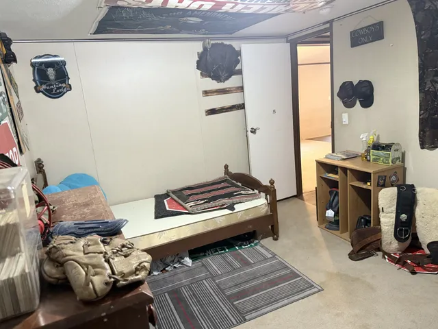 a view of an empty room with a yard