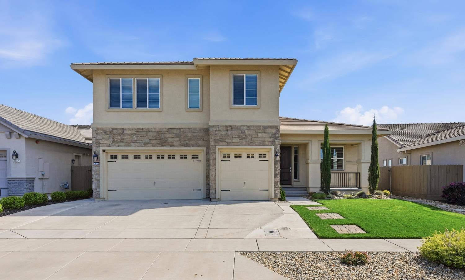 2012 Van Ruiten Drive Lodi, CA 95242 - Photo 1 of 49 a view of a house with a yard