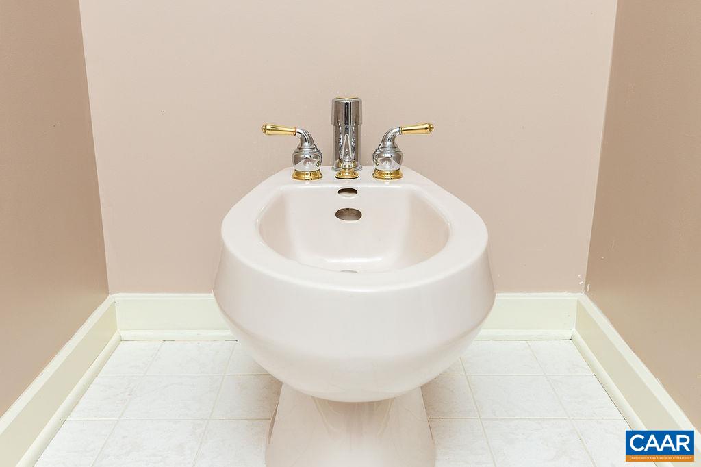 91 Bear Run Wintergreen, VA 22967 - Photo 20 of 54 a white bath tub sitting in a bathroom