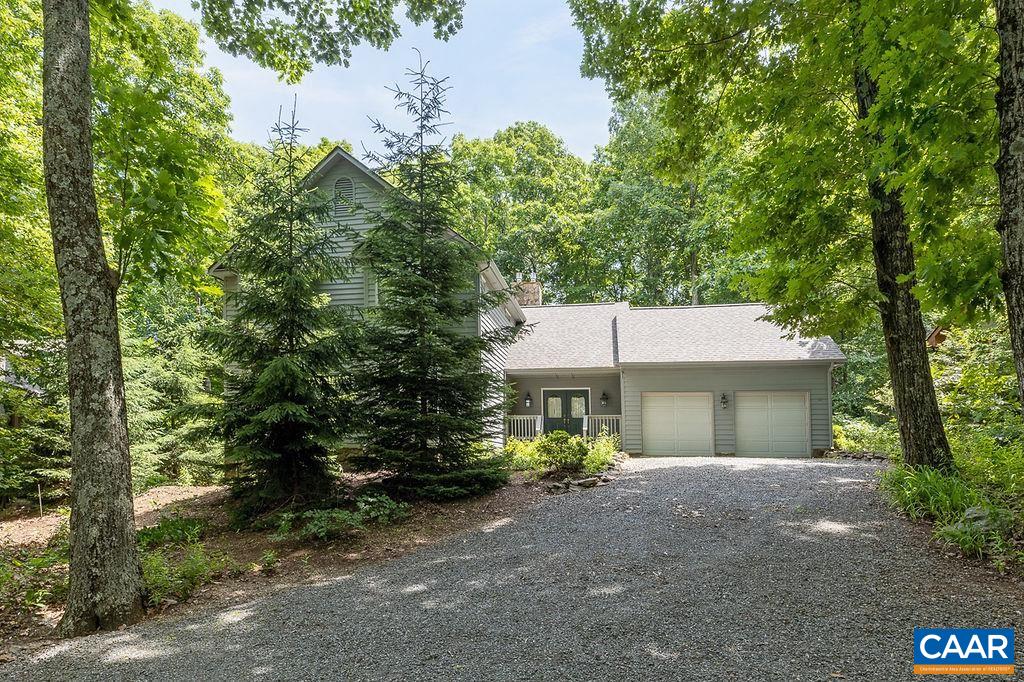 91 Bear Run Wintergreen, VA 22967 - Photo 38 of 54 a view of a house with a tree and plants