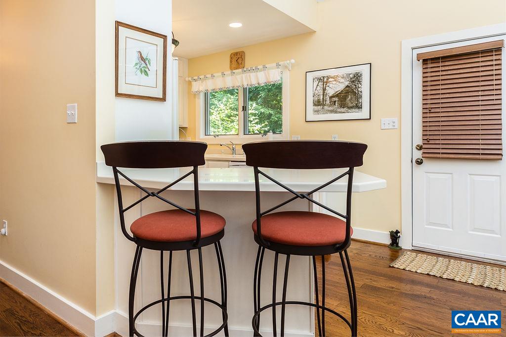 91 Bear Run Wintergreen, VA 22967 - Photo 6 of 54 a view of a dining room with furniture and wooden floor