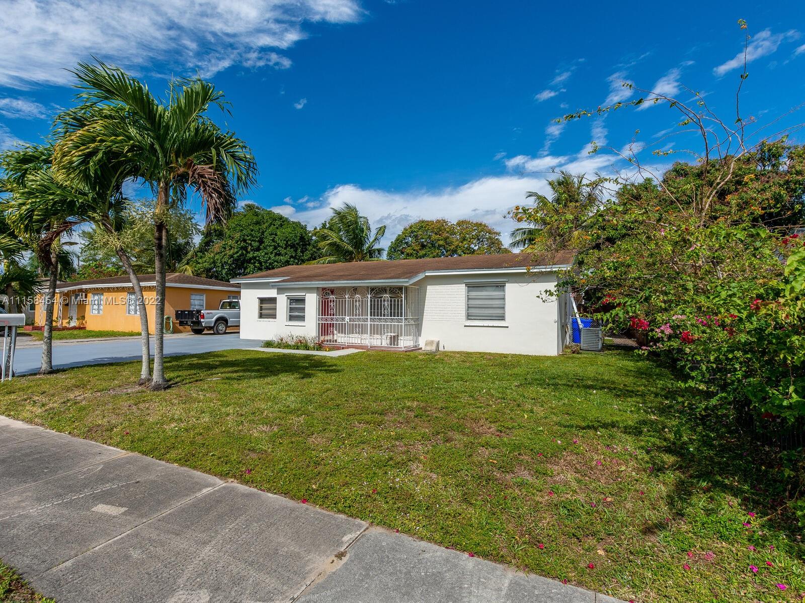 6731 Southwest 5th Terrace Miami, FL 33144 - Photo 2 of 33 a view of a house with a backyard