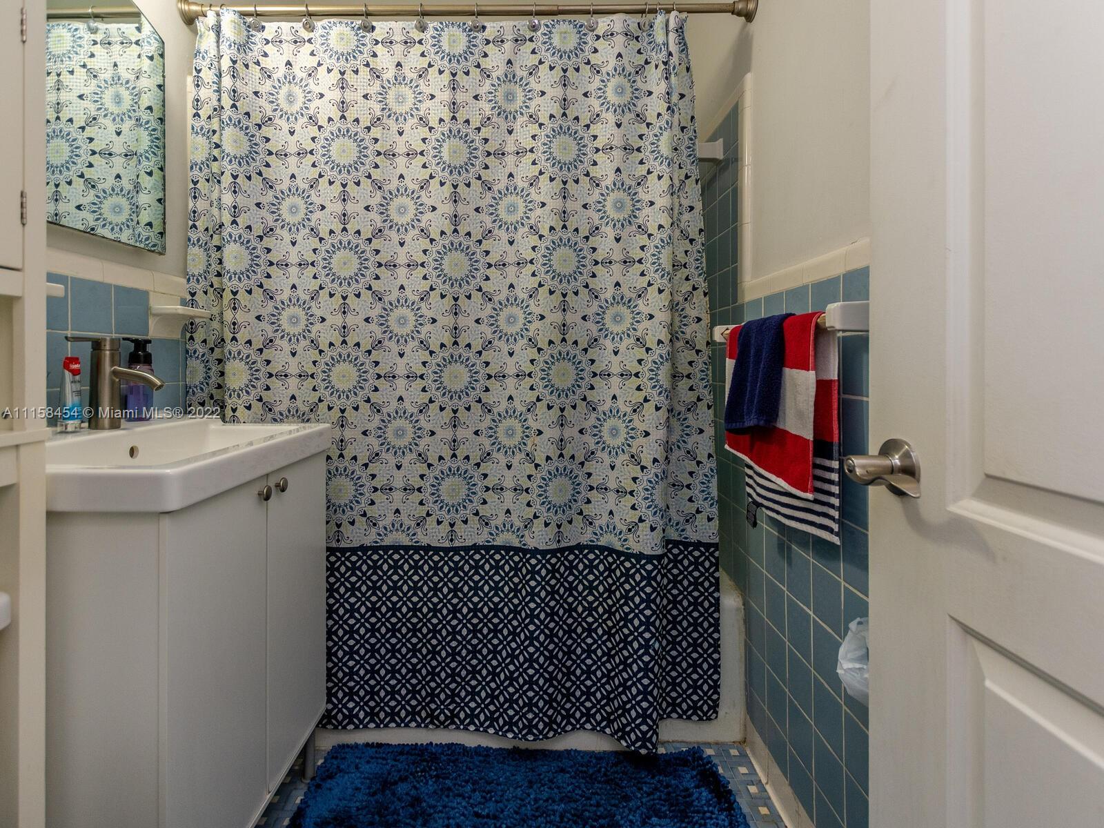 6731 Southwest 5th Terrace Miami, FL 33144 - Photo 21 of 33 a bathroom with a sink toilet and shower