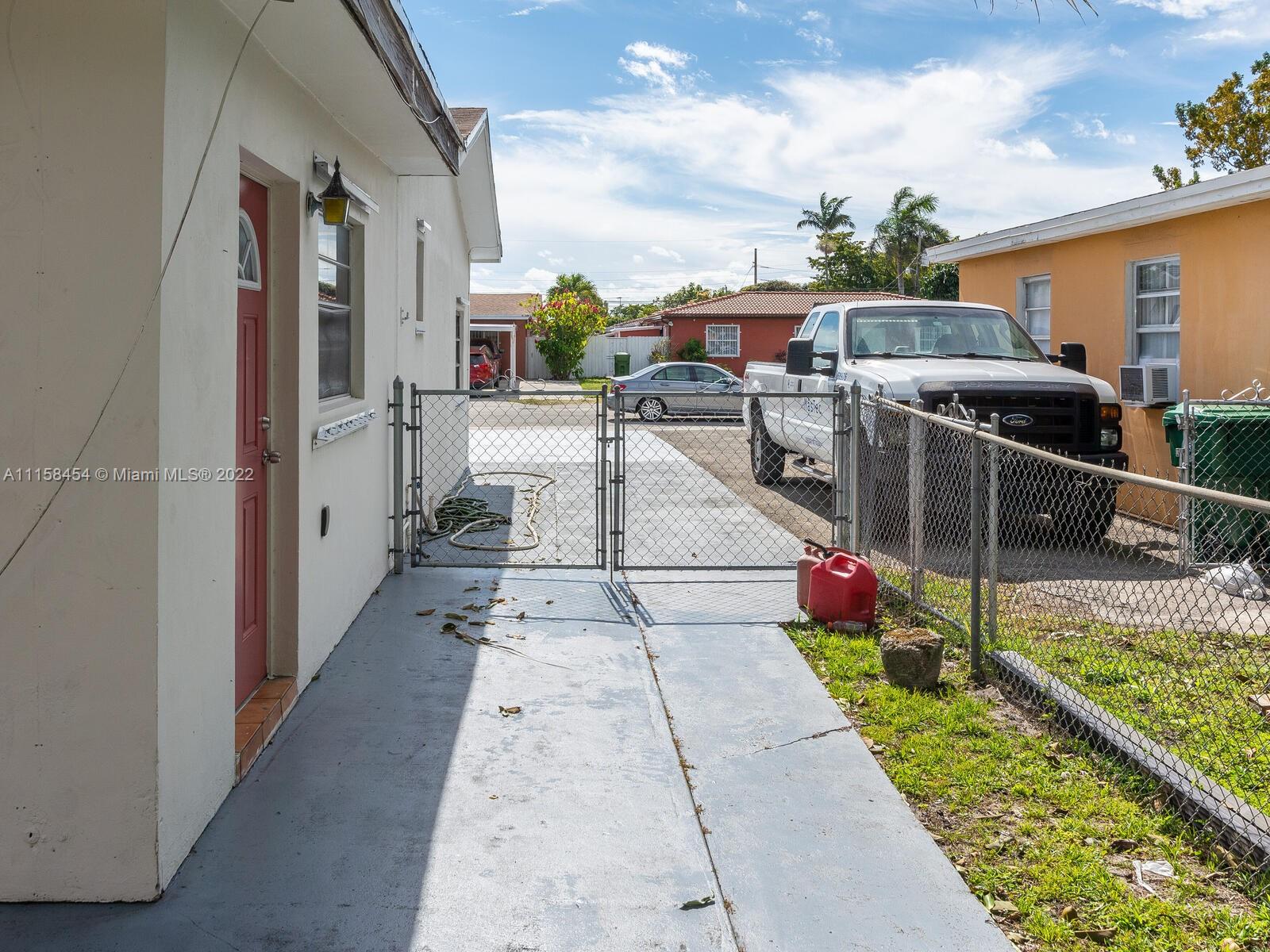 6731 Southwest 5th Terrace Miami, FL 33144 - Photo 32 of 33 a view of a backyard with sitting area