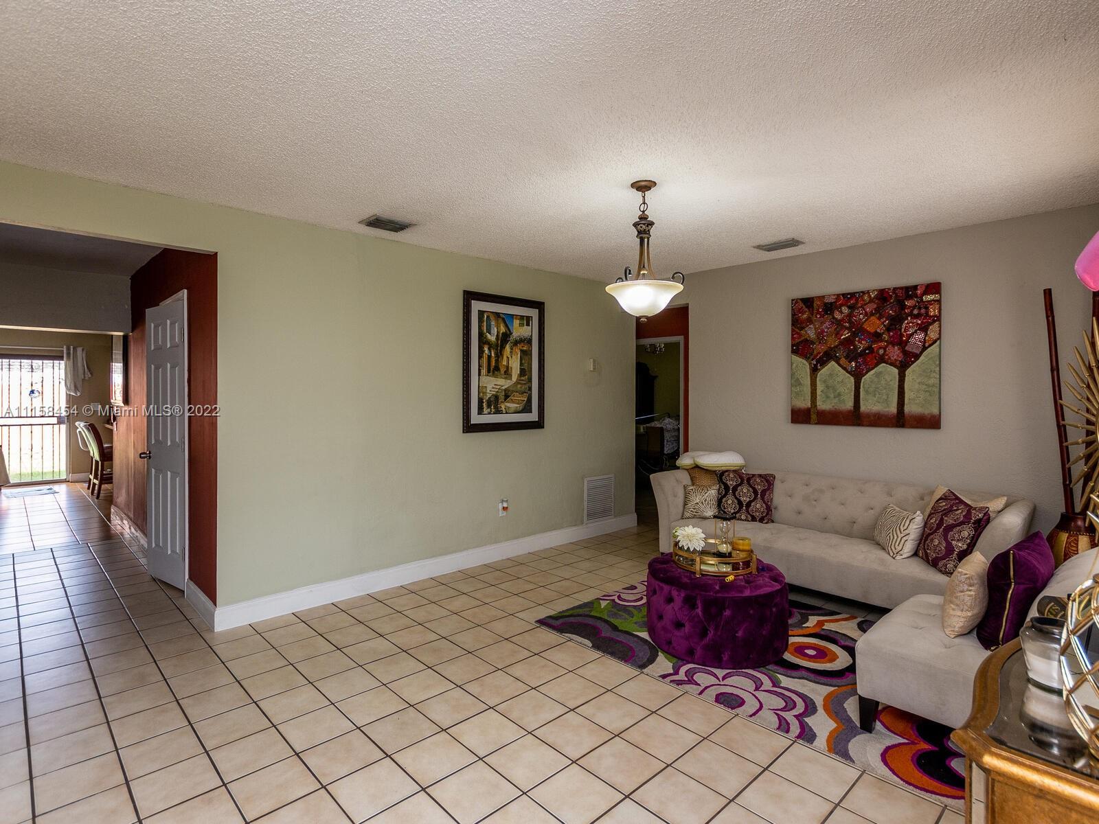 6731 Southwest 5th Terrace Miami, FL 33144 - Photo 8 of 33 a living room with furniture