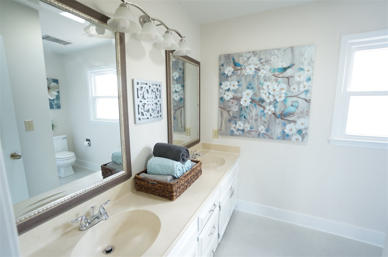 10101 Boxelder Drive Raleigh, NC 27613 - Photo 15 of 25 Spacious layout & dual vanities for added personal space & convenience. Large window displays beautiful scenic backdrop just outside. Master Bath/Spa