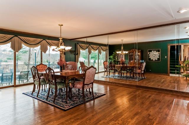 365 Bateman Road Barrington, IL 60010 - Photo 8 of 25 a view of a dining room with furniture window and wooden floor