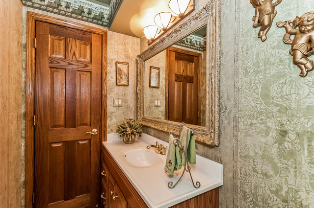 365 Bateman Road Barrington, IL 60010 - Photo 9 of 25 a bathroom with a sink a mirror and shower