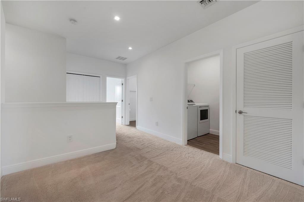 7549 Carnegie Way Naples, FL 34119 - Photo 12 of 22 a view of a hallway