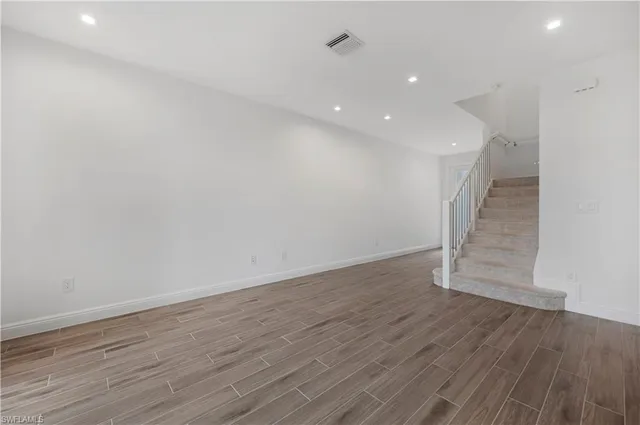 a view of entryway with wooden floor