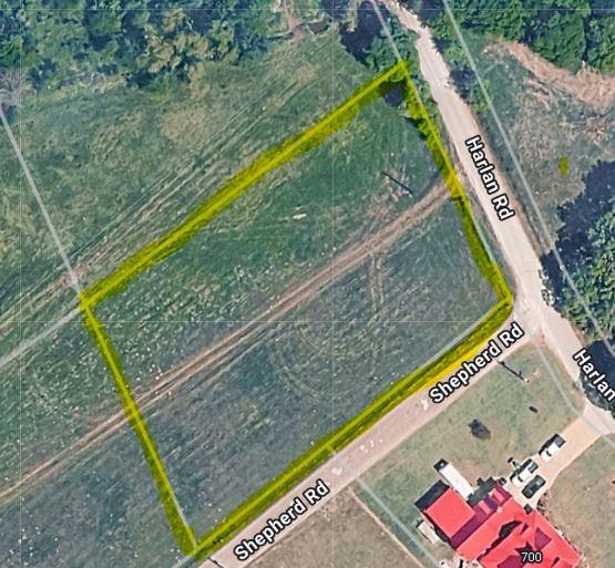 Satellite Imagery. An aerial depiction of the property, its boundaries, and adjacent roadways