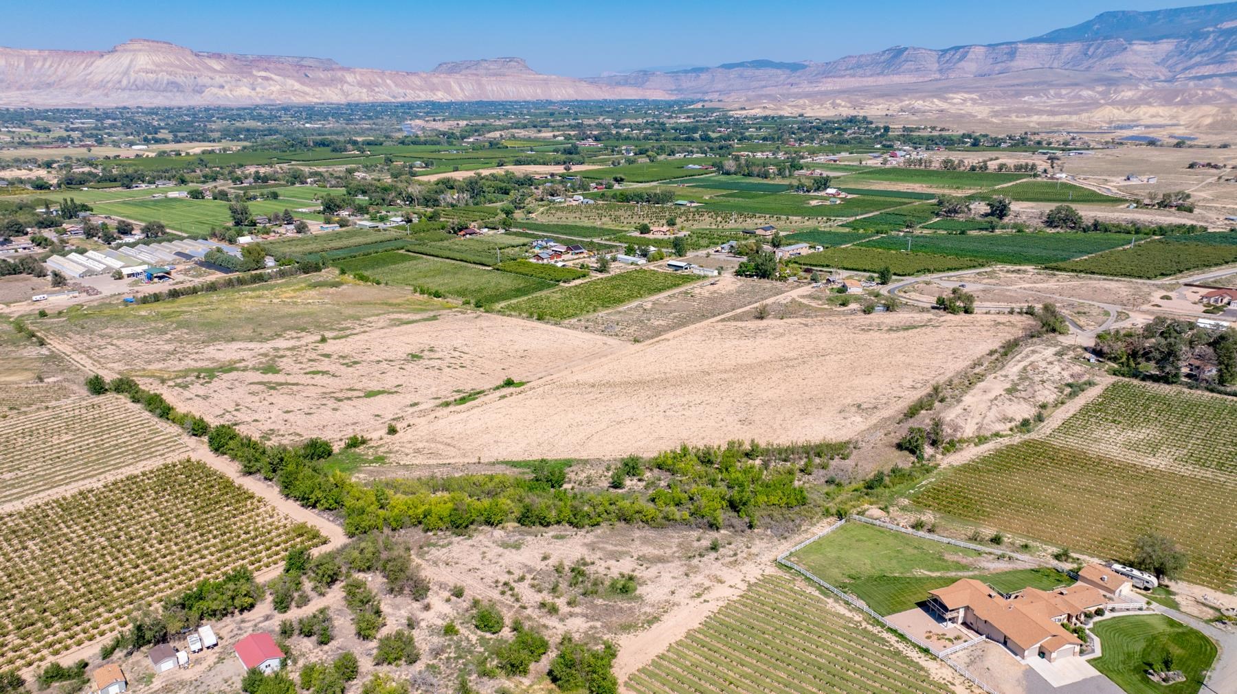 267 33 Road Palisade, CO 81526 - Photo 30 of 42 a view of a city with a lake