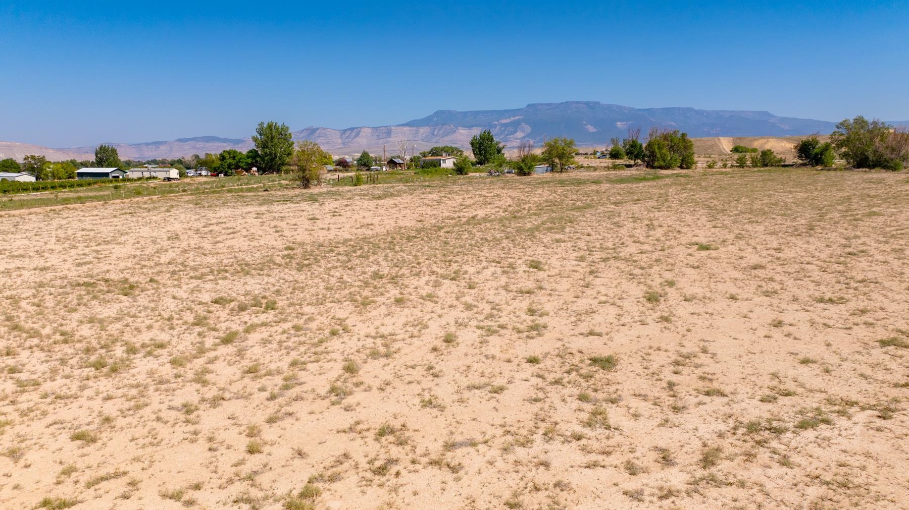 267 33 Road Palisade, CO 81526 - Photo 7 of 42 a view of an ocean beach and mountain