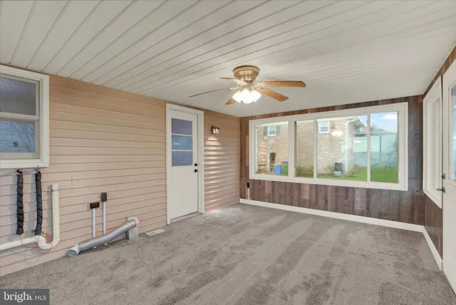 an empty room with windows