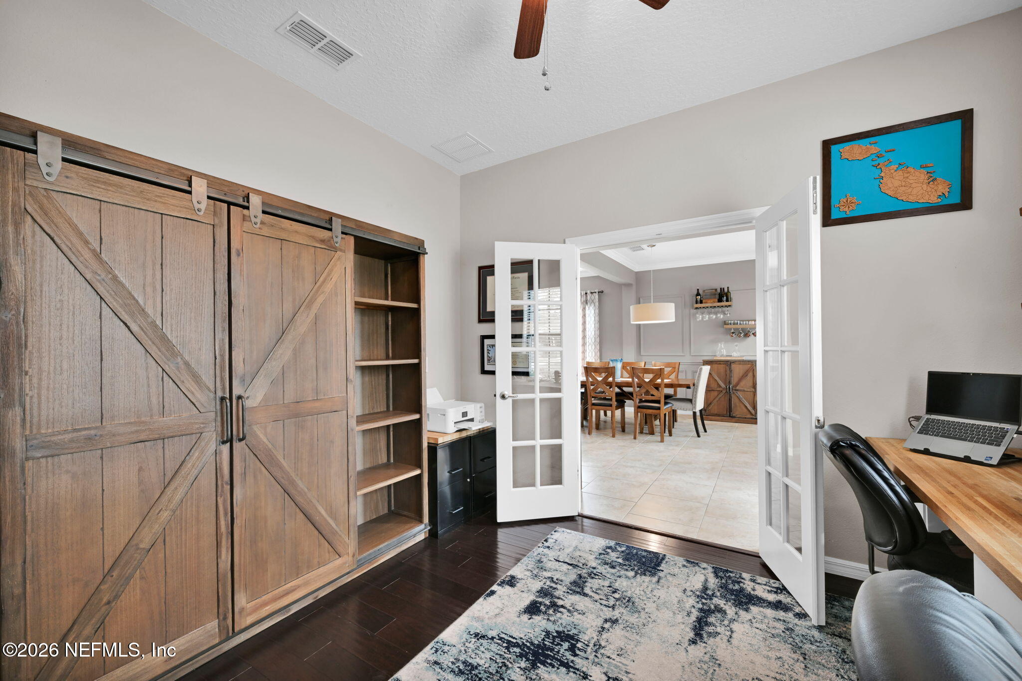 212 North Arabella Way St. Johns, FL 32259 - Photo 12 of 83 a living room with furniture and a flat screen tv