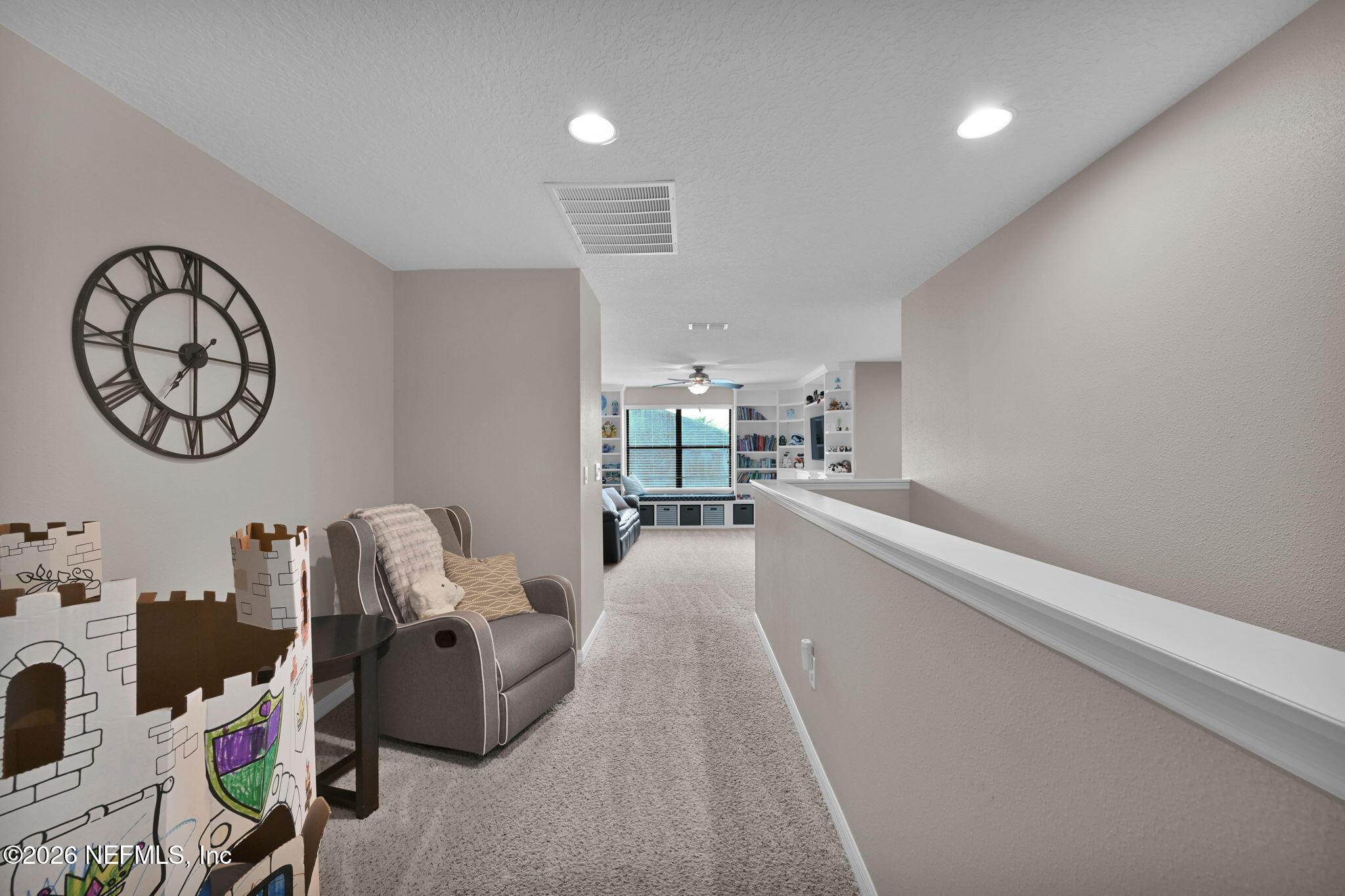 212 North Arabella Way St. Johns, FL 32259 - Photo 34 of 83 a living room with furniture and a wooden floor