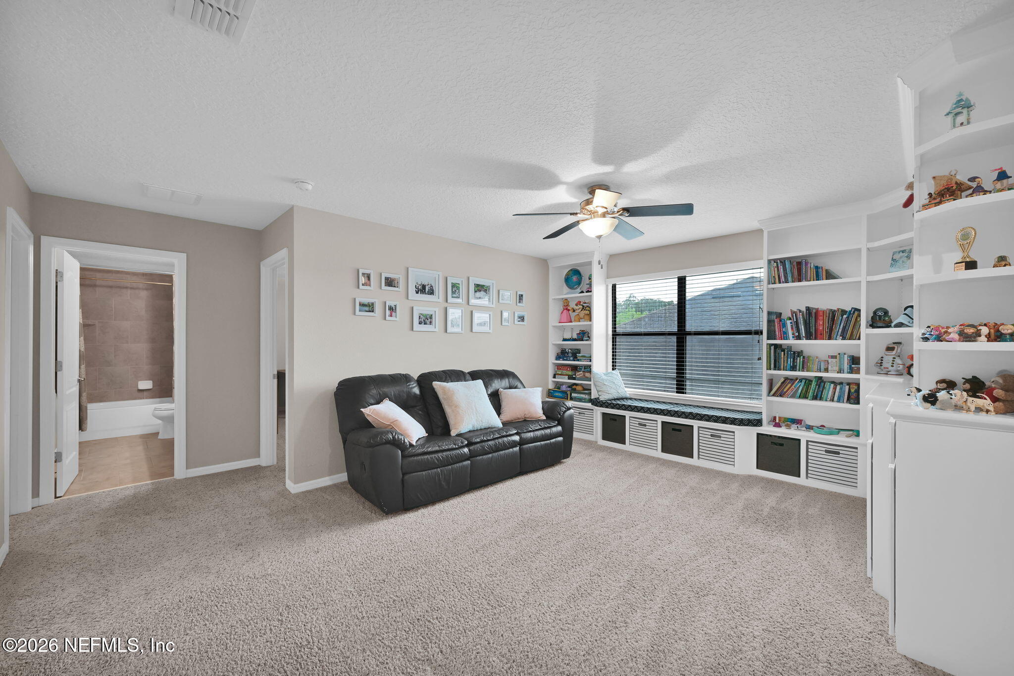 212 North Arabella Way St. Johns, FL 32259 - Photo 37 of 83 a living room with stainless steel appliances furniture and a kitchen view