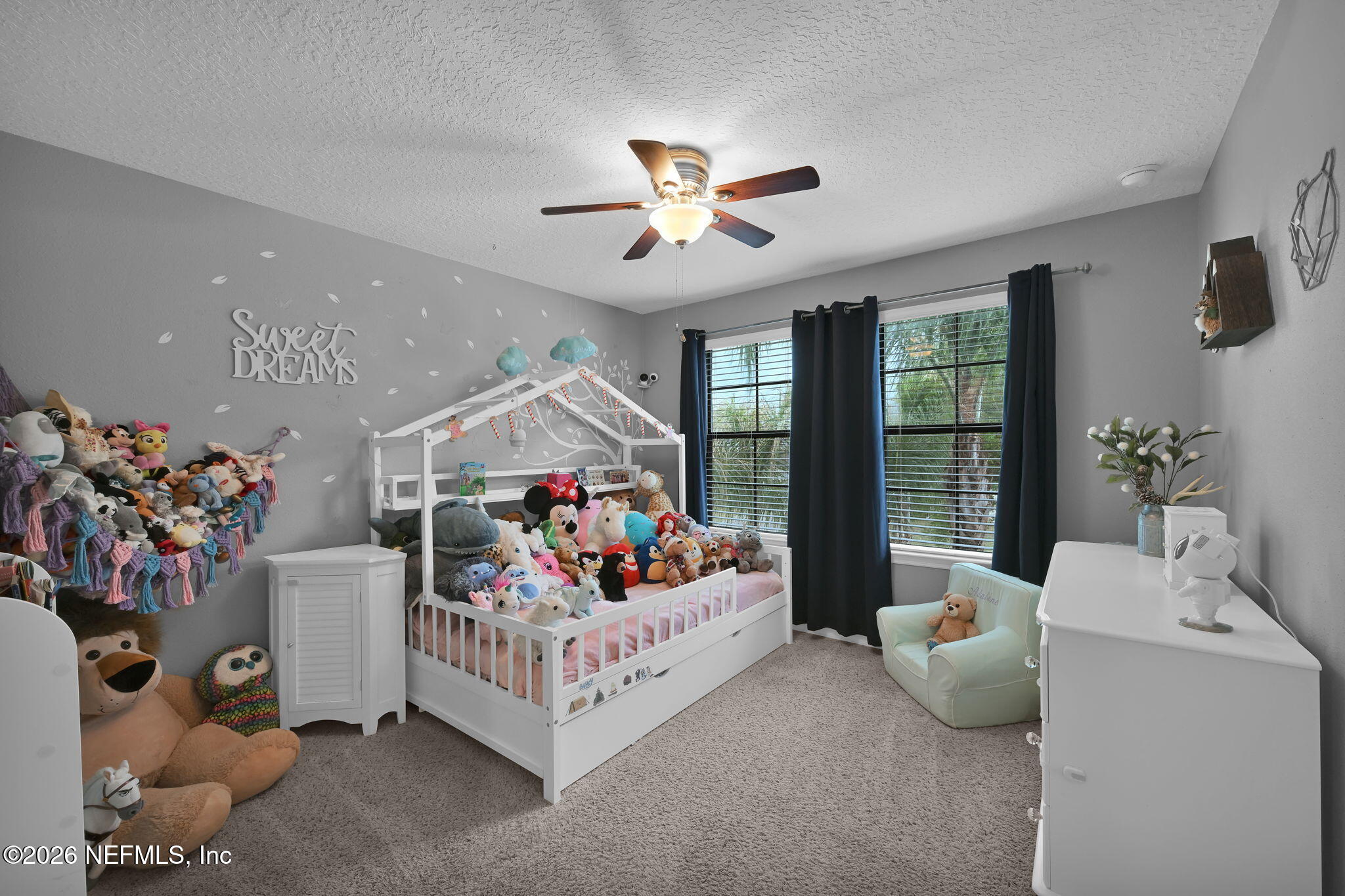 212 North Arabella Way St. Johns, FL 32259 - Photo 39 of 83 a bedroom with furniture and a chandelier fan