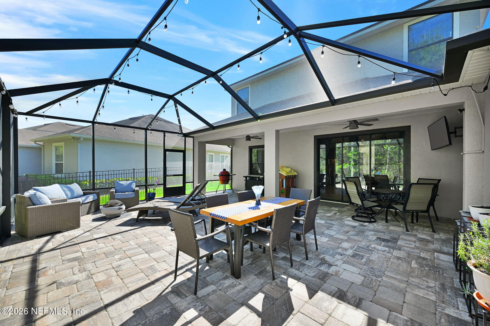 212 North Arabella Way St. Johns, FL 32259 - Photo 44 of 83 a outdoor space with lots of tables and chairs