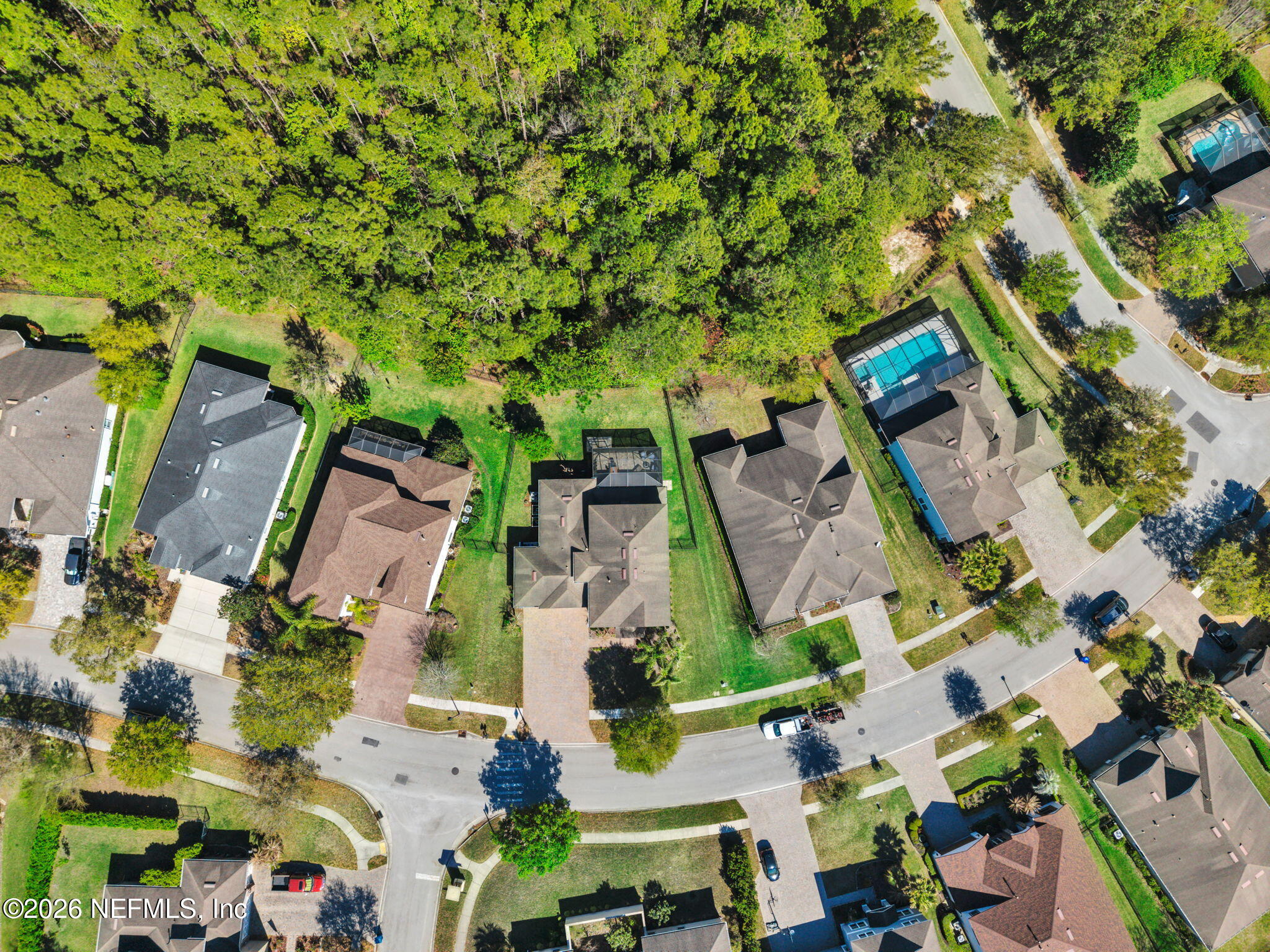 212 North Arabella Way St. Johns, FL 32259 - Photo 58 of 83 an aerial view of multiple houses with yard