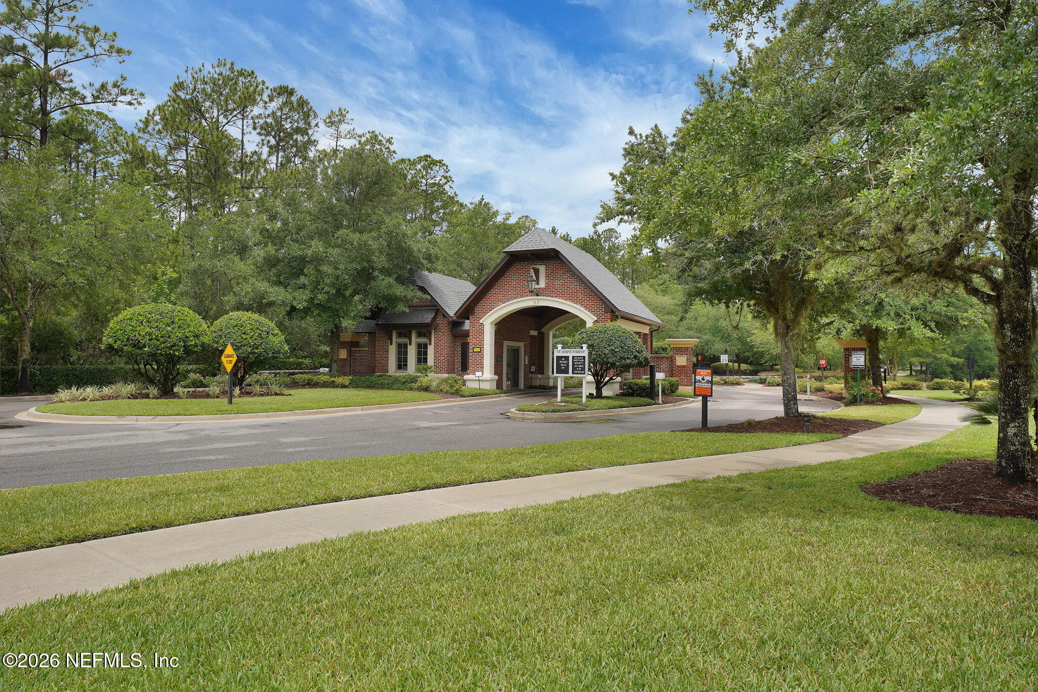 212 North Arabella Way St. Johns, FL 32259 - Photo 64 of 83 a front view of house with yard and green space
