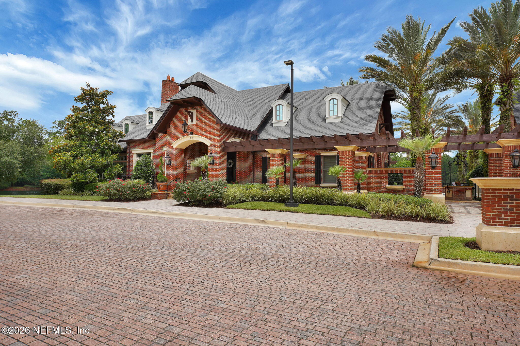 212 North Arabella Way St. Johns, FL 32259 - Photo 65 of 83 a front view of a house with a yard and a garage