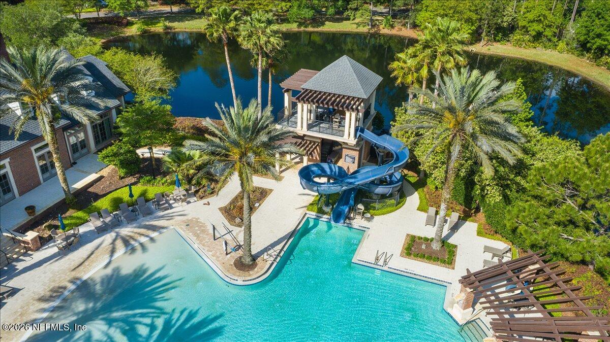 212 North Arabella Way St. Johns, FL 32259 - Photo 72 of 83 an aerial view of a house having yard