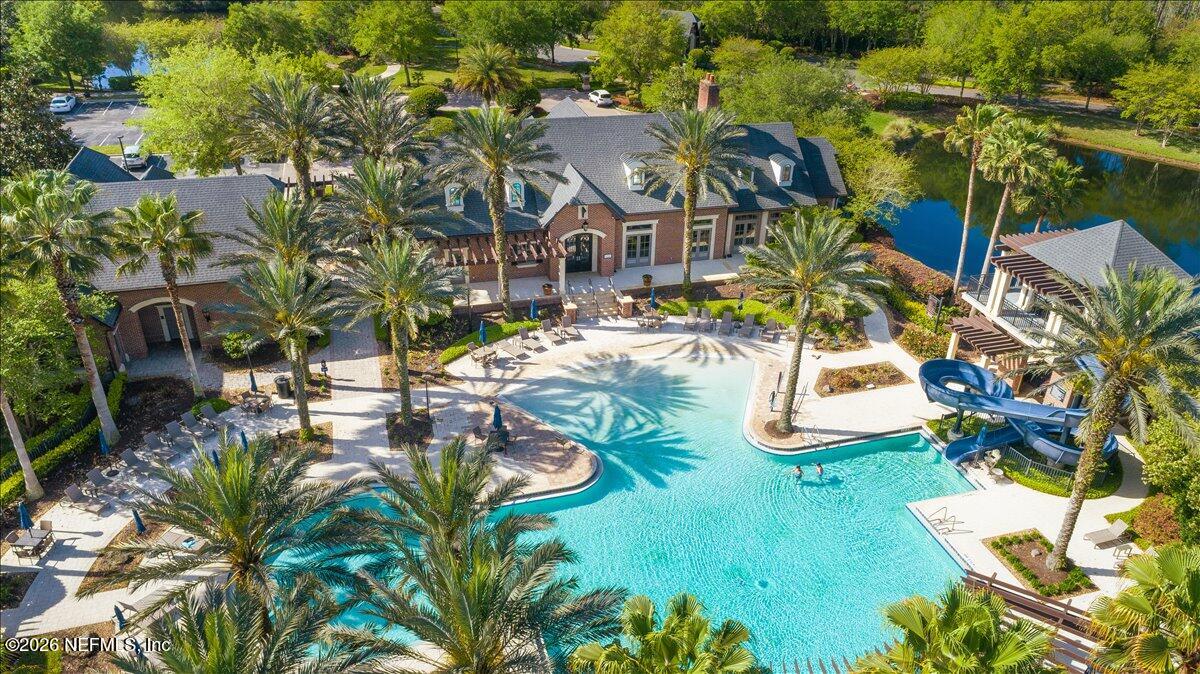 212 North Arabella Way St. Johns, FL 32259 - Photo 73 of 83 an aerial view of residential houses with outdoor space and trees all around