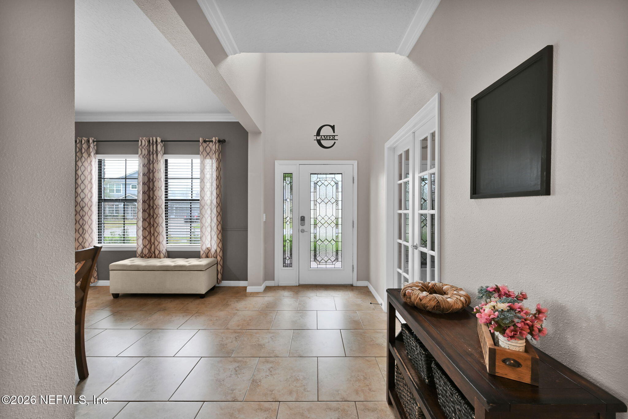 212 North Arabella Way St. Johns, FL 32259 - Photo 10 of 83 a living room with furniture and a flat screen tv